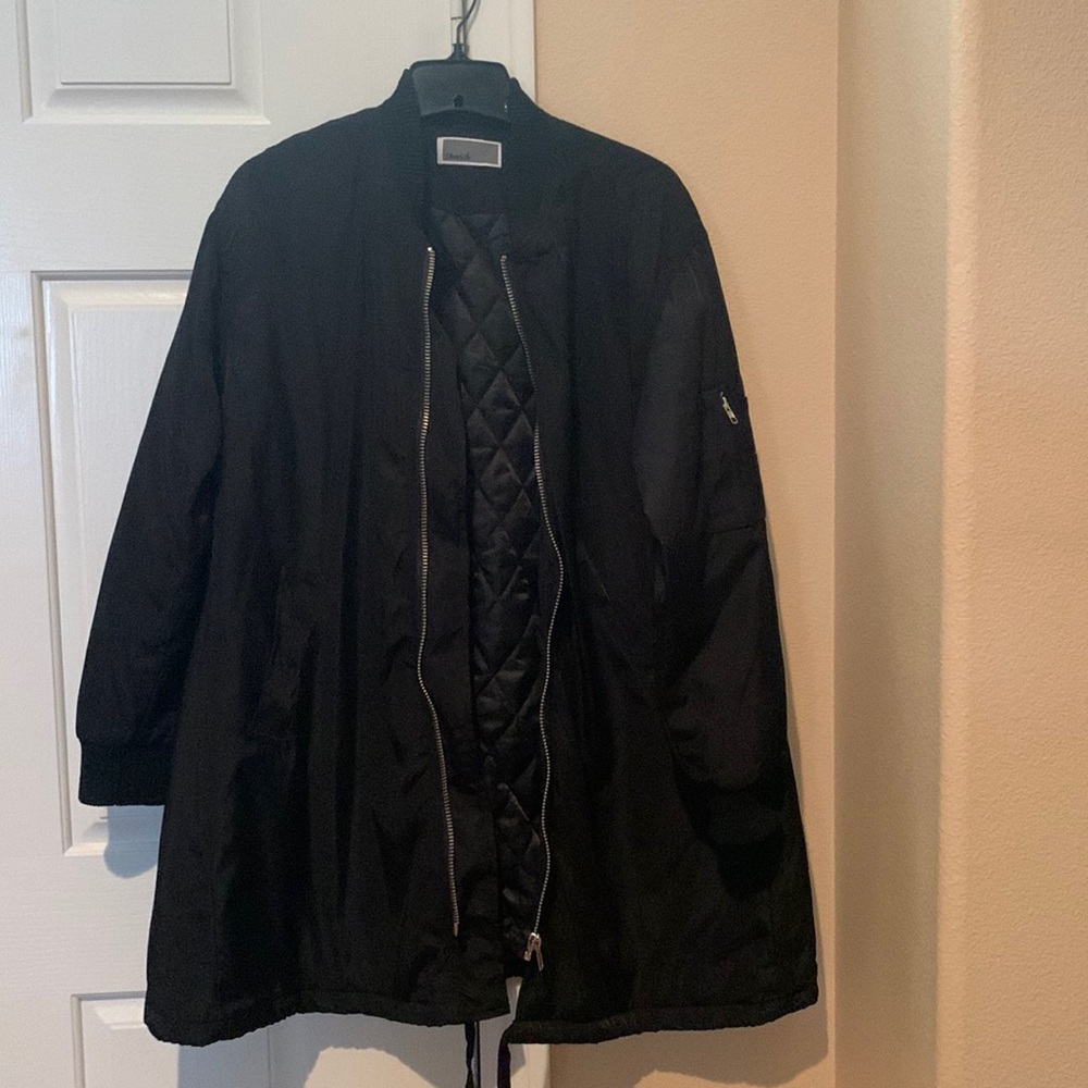 Black quilted coat